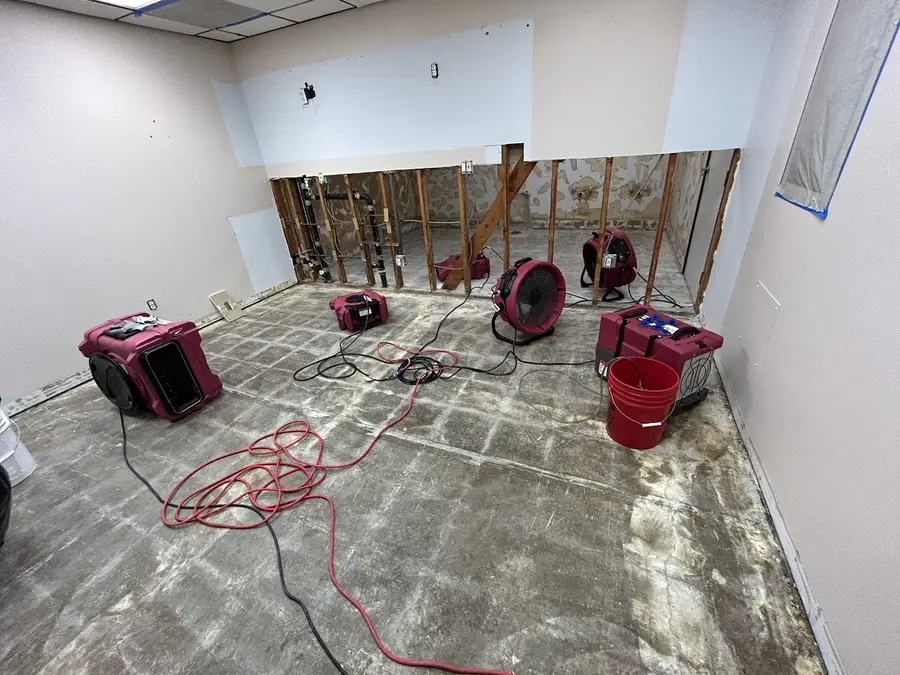 Air movers drying a room after a leak in Canyon Country, CA