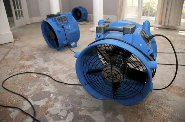 Air movers drying a floor in Canyon Country, CA