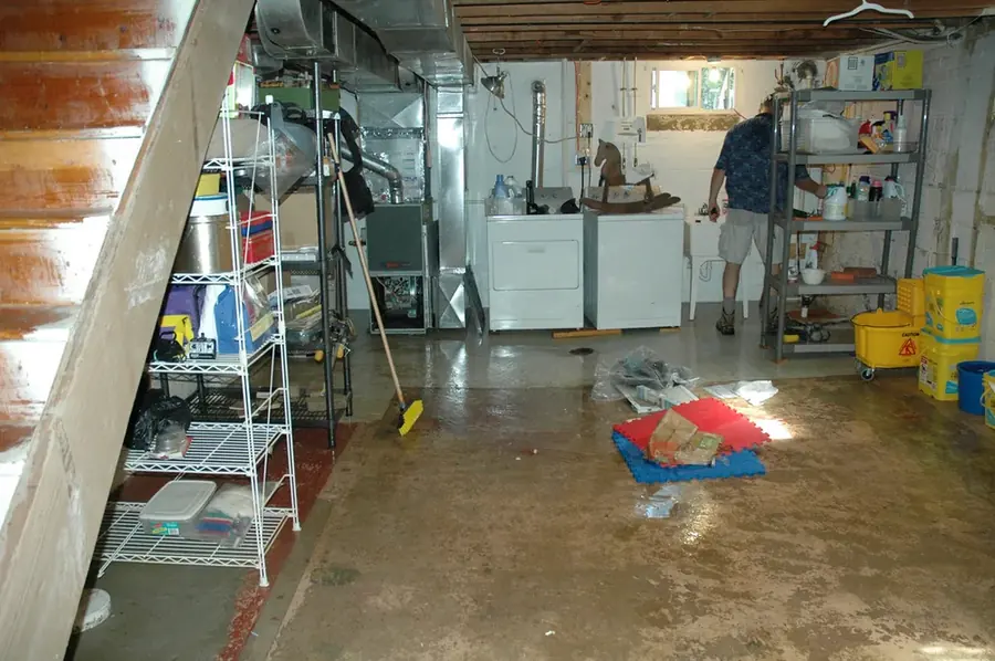 Appliance supply line leak flooding a Canyon Country, CA utility room