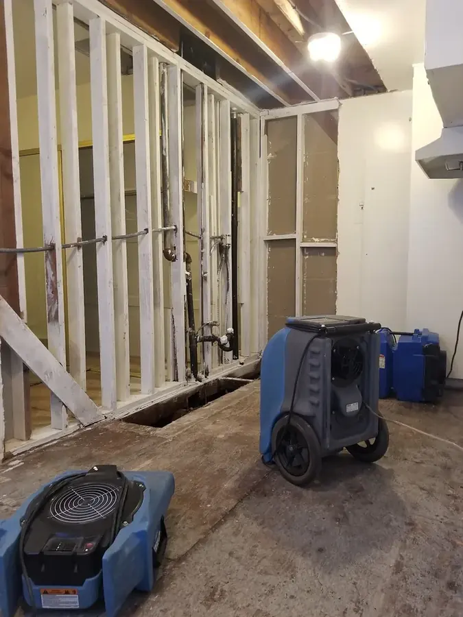 Water damage from a burst pipe being dried in a Canyon Country, CA home