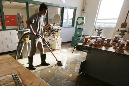Technician extracting standing water in a Canyon Country, CA home